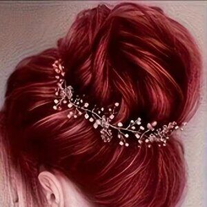 CLIP ON BUN in 99J Ruby Red